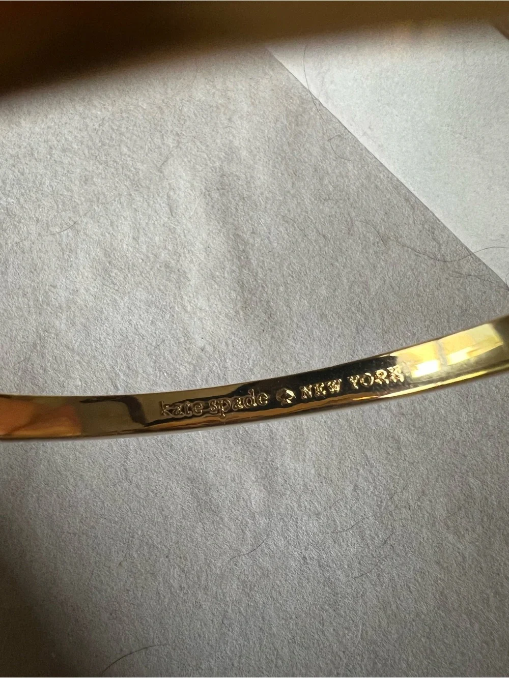Kate Spade Gold-Tone Pink Heart Accent Bangle Bracelet - Picture 3 of 3